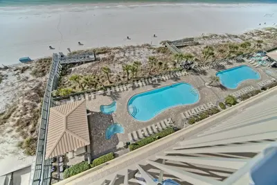 an aerial view of a resort with two pools at Tropical Gulf Front Condo with Picnic Area & Grills - Unit 0802 in Panama City Beach