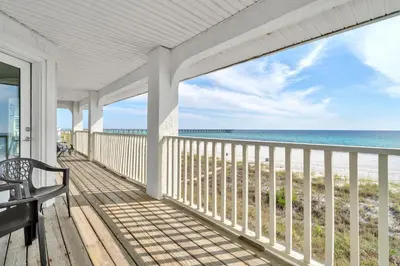 a porch with a view of the beach at Fishers in Panama City Beach