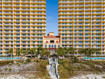 an aerial view of the resort with two tall buildings at Calypso Beach Resort in Panama City Beach