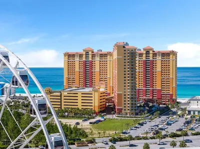 a view of a city with tall buildings and the ocean at Calypso Beach Resort in Panama City Beach