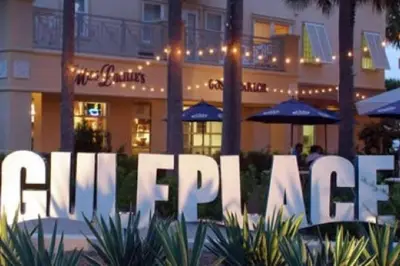 a large white sign in front of a building at Pinnacle Port B3-307 in Carillon Beach