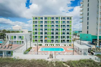 an image of a hotel with a pool at Flamingo Hotel & Tower in Panama City Beach