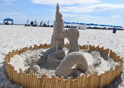 a sand castle on the beach in the sand at Days Inn by Wyndham Panama City Beach Beachfront Resort in Panama City Beach