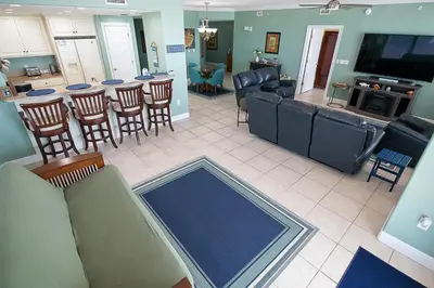 an overhead view of a living room and kitchen with a bar at Treasure Island 0212 in Panama City Beach