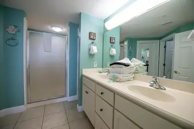 a bathroom with a sink and a shower at Treasure Island 0212 in Panama City Beach
