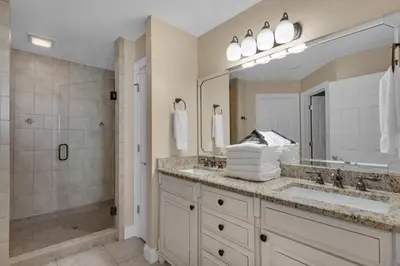 a bathroom with a sink and a shower at Treasure Island 0412 in Panama City Beach