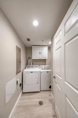 a laundry room with a washer and dryer at Treasure Island 2006 in Panama City Beach