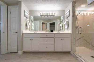 a bathroom with two sinks and a shower at Treasure Island 2006 in Panama City Beach