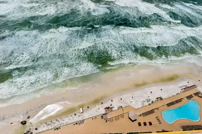an overhead view of a beach with the ocean at Treasure Island 2202 in Panama City Beach