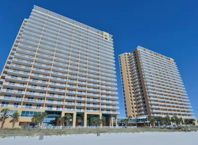 two tall buildings on the beach next to the beach at Splash 1505E in Panama City Beach