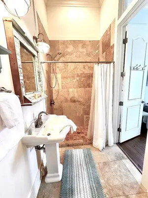 a bathroom with a sink and a shower at Saltwater Gospel in Inlet Beach