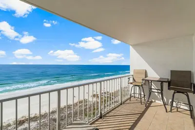 a balcony with a view of the ocean at The Summit 1128 in Panama City Beach