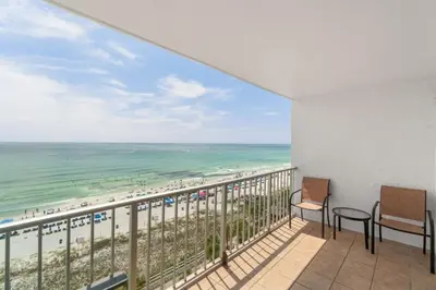 a balcony with a view of the beach at The Summit 1030 in Panama City Beach