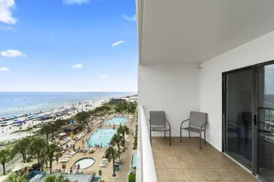 a view of the beach from the balcony of a hotel at The Summit 728 in Panama City Beach