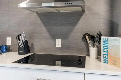 a kitchen counter with a stove top in a kitchen at The Summit 1205 in Panama City Beach