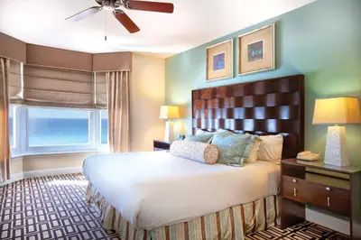 a bedroom with a large bed and a window at Club Wyndham Panama City Beach in Panama City Beach