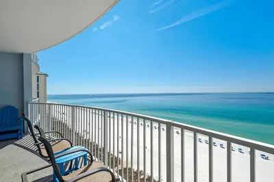 a balcony with a view of the beach and the ocean at Twin Palms 1201 in Panama City Beach