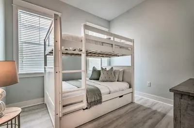a white bunk bed in a room with a window at Always Saturday Prominence Resort Townhome! in Inlet Beach
