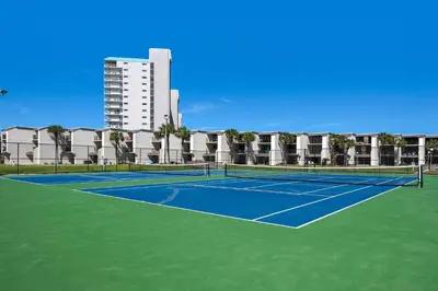 a tennis court in front of a building at Sugar Beach C-17 (2/2) in Panama City Beach