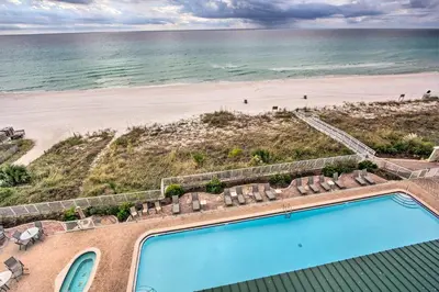 an overhead view of a swimming pool and the beach at High-Rise PCB Condo with Oceanfront Views and Pool! in Panama City Beach