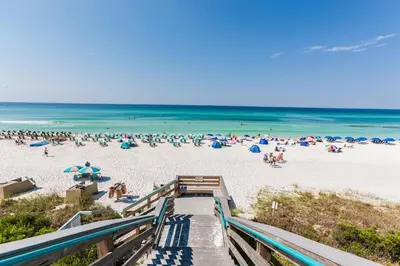 a view of a beach with a bunch of people at DRIFTWOOD COTTAGE at Seacrest Beach - 1581803 in Panama City Beach
