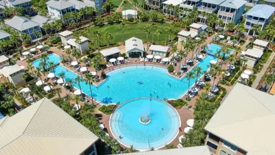 an overhead view of a pool at a resort at Beach Beyond Belief House & private pool & free bikes & private beach in Rosemary Beach