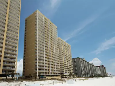 a row of tall buildings on the beach at Ocean Ritz 1902 in Panama City Beach