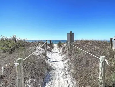 a path through the sand on the beach at Merrimac Resort #32 in Panama City Beach