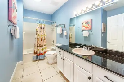 a bathroom with a sink and a toilet at Calypso 2-2304 West in Panama City Beach