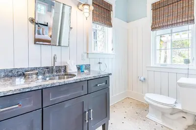 a bathroom with a sink and a toilet at Stay Salty in Santa Rosa Beach