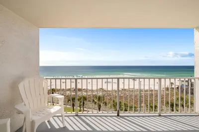 a balcony with a view of the ocean at The Summit 606 in Panama City Beach