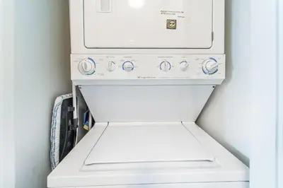 a white washer and dryer in a refrigerator at Beachside Villas 332 in Santa Rosa Beach