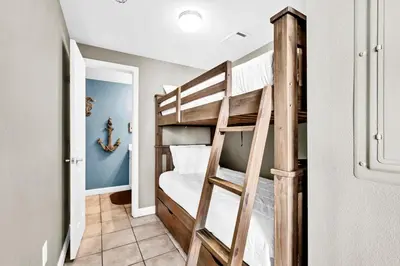 a bunk bed room with two bunk beds at Shores of Panama 1003 in Panama City Beach