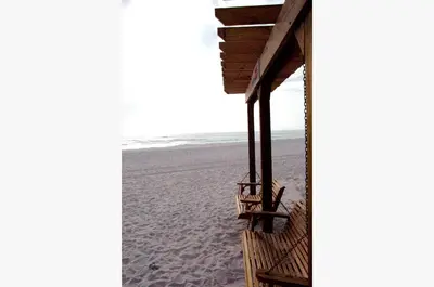 a view of the beach from the porch of a beach house at Sunbird 0908W 'Captain's Cove' in Panama City Beach