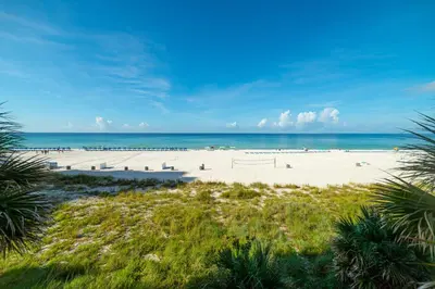 an image of a beach with the ocean in the background at Shores of Panama 0201 'Down By the Sea' in Panama City Beach