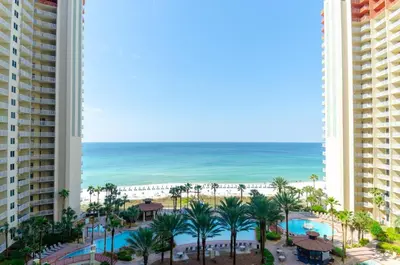 a view of the beach from the balcony of a resort at Shores of Panama 0817 'Sunset Lagoon' in Panama City Beach