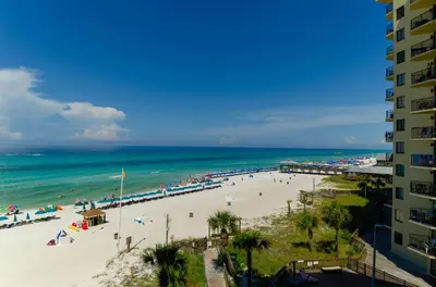 a view of a beach with people and the ocean at Sunbird 509E 'Window on the Gulf' in Panama City Beach