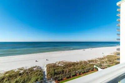 a view of the beach from the balcony at Mariner West 606 'Beach Happy' in Panama City Beach