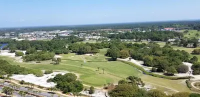 an aerial view of a golf course at Commodore 1303 'Rest Ashored' in Panama City Beach