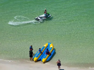 a group of people on a boat in the water at Watercrest 1004 'Neptune's Reef' in Panama City Beach