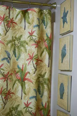 a curtain with a floral pattern on a wall at Edgewater W608 'Sea Forever' in Panama City Beach