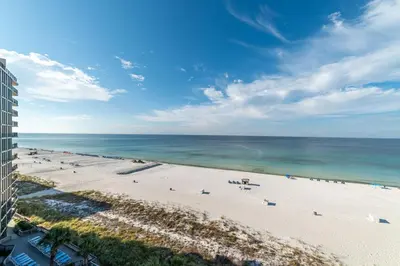 an overhead view of a beach and the ocean at Edgewater 3-0810 'Alpaca My Bags' in Panama City Beach