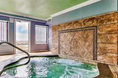 a jacuzzi tub in the middle of a room at Regency Towers 1122 'Seas The Day' in Panama City