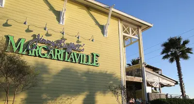 a building with a sign that reads mixtapearma at Emerald Beach 1535 in Panama City Beach