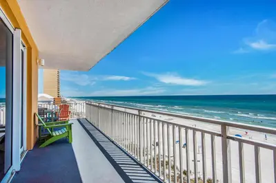 a balcony with a view of the beach at Splash 207E in Panama City Beach
