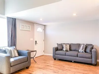a living room with a couch and a chair at 5218 Beach Dr B in Panama City Beach