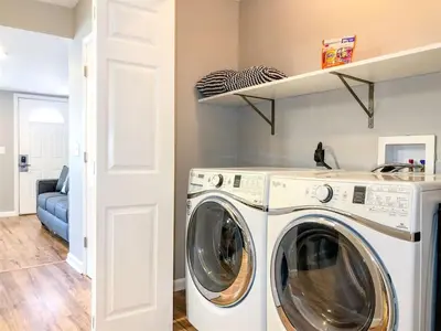 a washer and dryer in a laundry room at 5218 Beach Dr B in Panama City Beach