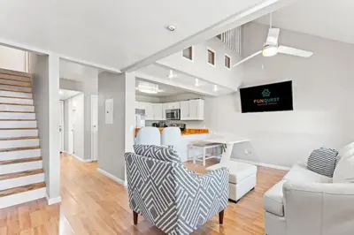 a living room with a couch and a table at 5218 Beach Dr C in Panama City Beach
