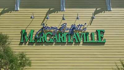 a neon sign on the side of a building at Laketown Wharf 335! 1 BD, 2 Bathroom with Amazing Amenities in Panama City Beach