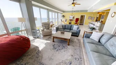 a living room with a couch and a table at Marisol 1001 in Panama City Beach